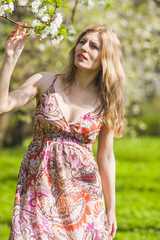 Fototapeta premium Portrait of Sensual Dreaming Blond in Spring Forest Outdoors.