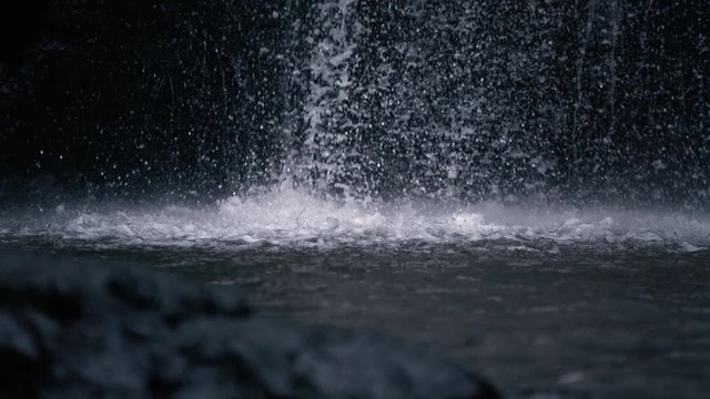 Base of waterfall close up in super slow motion (anamorphic lens, shot on Phantom)