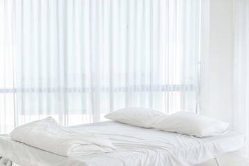 Fototapeta na wymiar White clean pillow natural fabric cotton style on the white bed