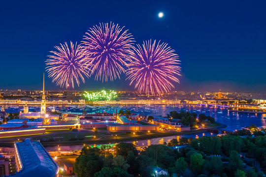Saint Petersburg. Fireworks over the city. Russia. Festive fireworks in St. Petersburg. Scarlet Sails. Holidays in Russia. The Neva River in St. Petersburg. Peter-Pavel's Fortress.