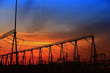 Electric tower, silhouette at sunset