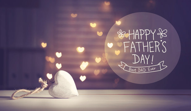 Father's Day message with a white heart with heart shaped lights