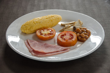American Breakfast with omelet egg and ham