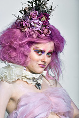 Fototapeta premium Beautiful girl with purple hair. Bright makeup