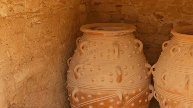 Close-up shot of two giant pithoi, or storage jars, the Minoan Palace of Knossos, Heraklion, Crete, Greece