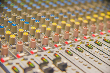 Close up of  digital sound audio mixer and amplifier equipment or music mixer equalizer console....