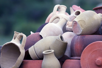 Set of stacked together broken clay pots