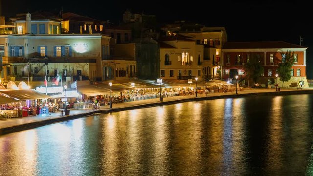 Night timelapse view of the famous Chania promenade in the island of Crete, Greece