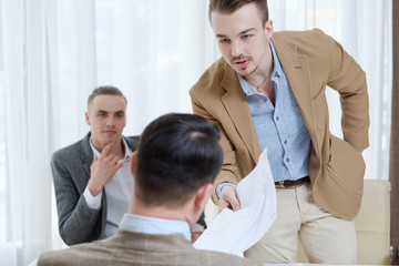 boss his employee a lecture. verbal reprimand and scolding for some work failure. cruel business world concept