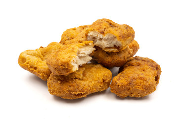 Chicken nuggets on a white background.