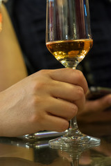 Hand picked wine glass in celebration.