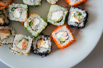 Sushi in a plate top view close up . Japanese cuisine.