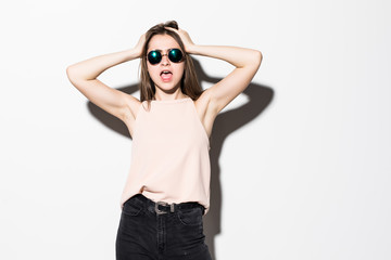 Beauty Fashion brunette model girl in sunglasses Isolated on white. Fashion blogger