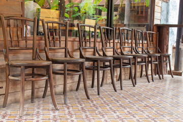 Old wooden chairs in the aisles