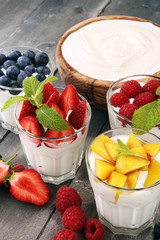Yogurt and berry. Fresh fruit yogurt with fresh berries and peaches