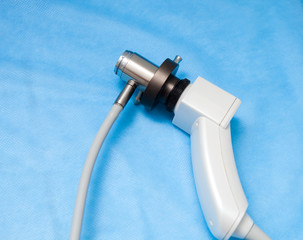 Videorectoscope for medical research on blue medical tablecloth