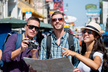 Group of tourist backpacker friends traveling in Bangkok Thailand on vacations