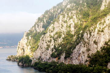 Summer landscape of Danube Gorge, at the border between Romania and Serbia. Mountain road on the Danube coast