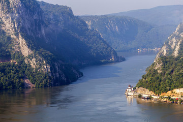 Fototapeta na wymiar Summer landscape of Danube Gorge, at the border between Romania and Serbia. Mraconia orthodox monastery 