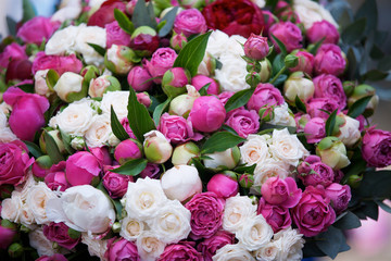 The composition is made by florists from fresh flowers.