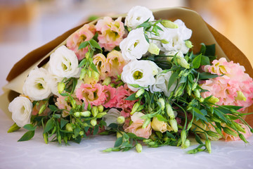 The composition is made by florists from fresh flowers.