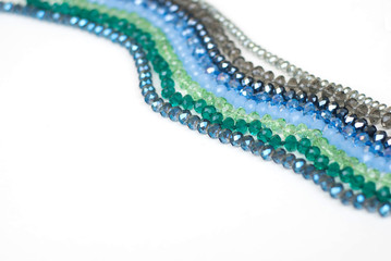 Obraz premium Colorful Shinny Crystal Beads Glass Isoalted on White Background Copy space for Text Fashion Beauty