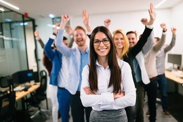 Portrait of business team posing in office