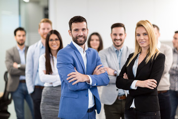 Portrait of business team posing in office