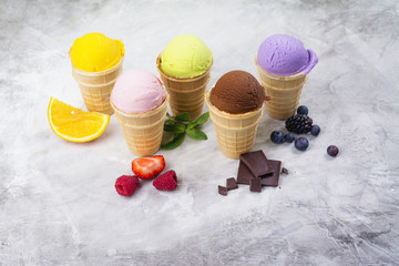 Assortment of natural ice cream - strawberry, chocolate, orange, blueberry and mint