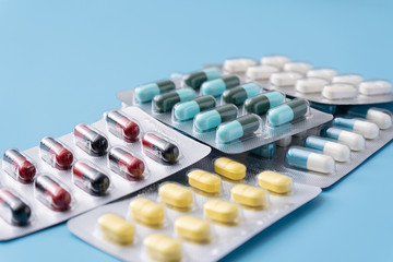 medicine  pills on blue background Copy space for text Assorted pharmaceutical Healthy Eating, Lifestyle