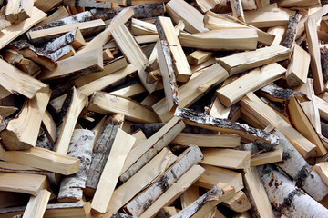 Pile of chopped fire wood prepared for winter