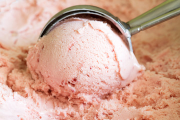 Strawberry scoop ice cream background concept closeup