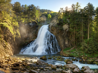 Fototapeta premium Waterfall with mossy rocks in Golling, Austria