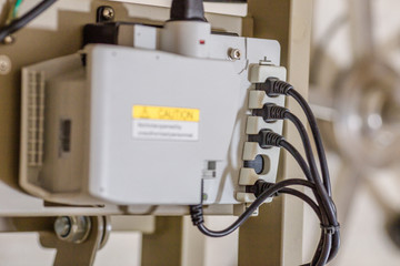 equipment and medical devices in modern operating room (A hospital bed waiting the next patient.)