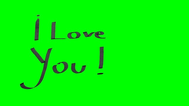 Green screen animation calligraphy writing I love you and drawing a heart with black ink on paper texture