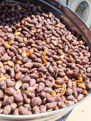 Machine for roasted nuts on street markets in old cities of Turkey.