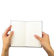 Empty opened notebook on hands holding isolated on white background, with clipping path