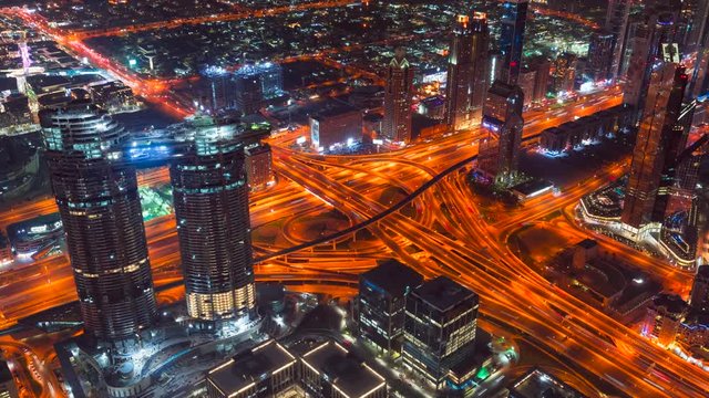 Night time lapse of modern downtown of Dubai. Sheikh Zayed crossroad