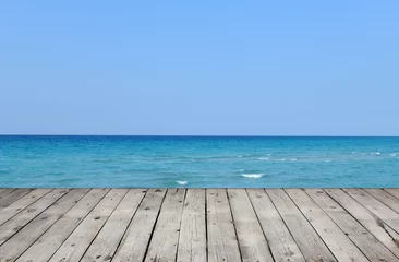 Poster Wooden pier with sea and sky © Vlad Ivantcov