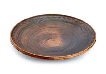 clay ethnic dishes on white background