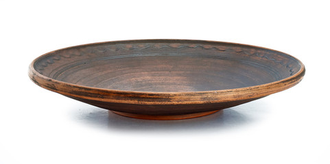 clay ethnic dishes on white background