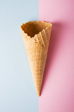 Empty cone waffle on a colored background.
