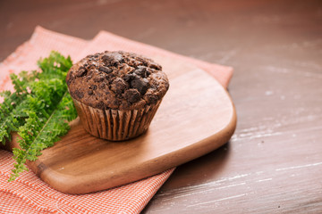 Dellicious homemade chocolate muffin on table. Ready to eat.