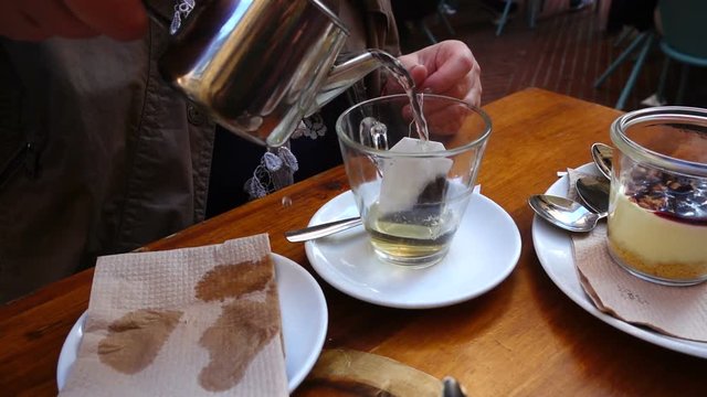 Tea in cafe. Slow motion.	Madrid, Spain.