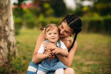 mom and daughter smiling and having fun