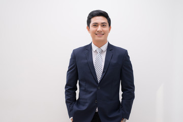 young business man portrait isolated on white © makistock