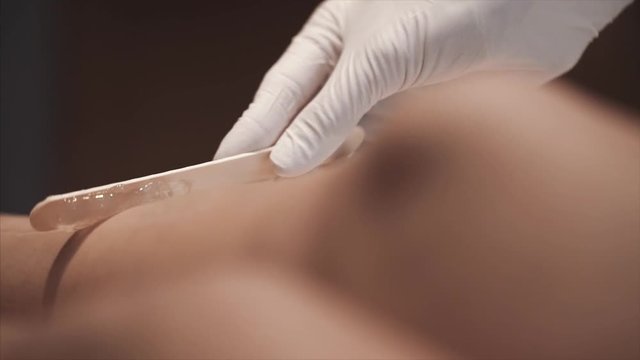 Doctor performing laser hair