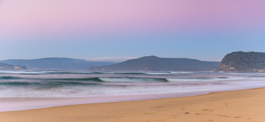 Fototapeta na wymiar Hazy Pink Sunrise Seascape