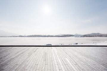 Naklejka premium Panoramic skyline with empty concrete square floor
