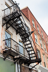 Old Fire Escape on the Outside of a Traditional Brick Building. Guelph, ON, Canada.